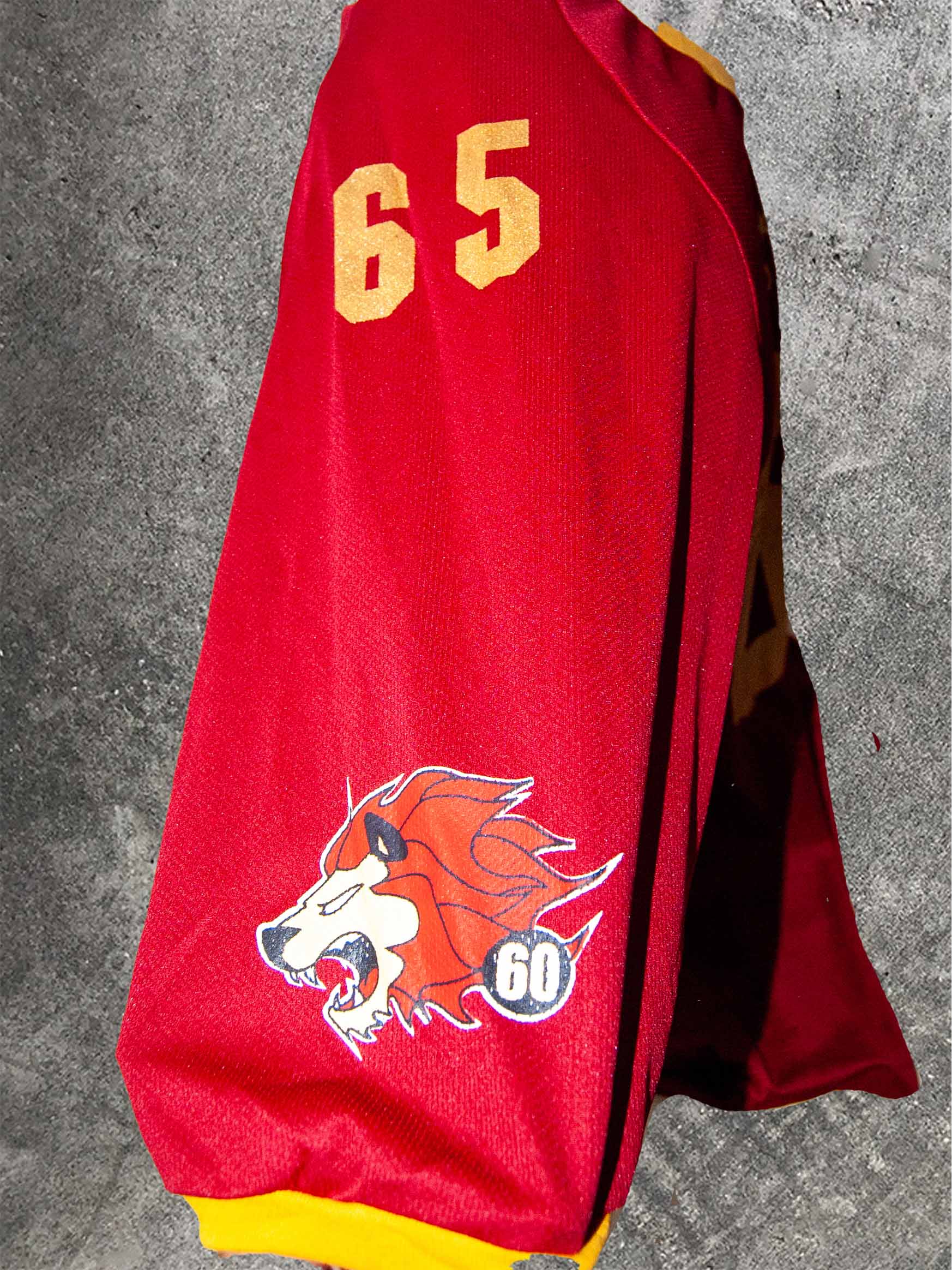 Detalhe da manga de camisa Red Lions